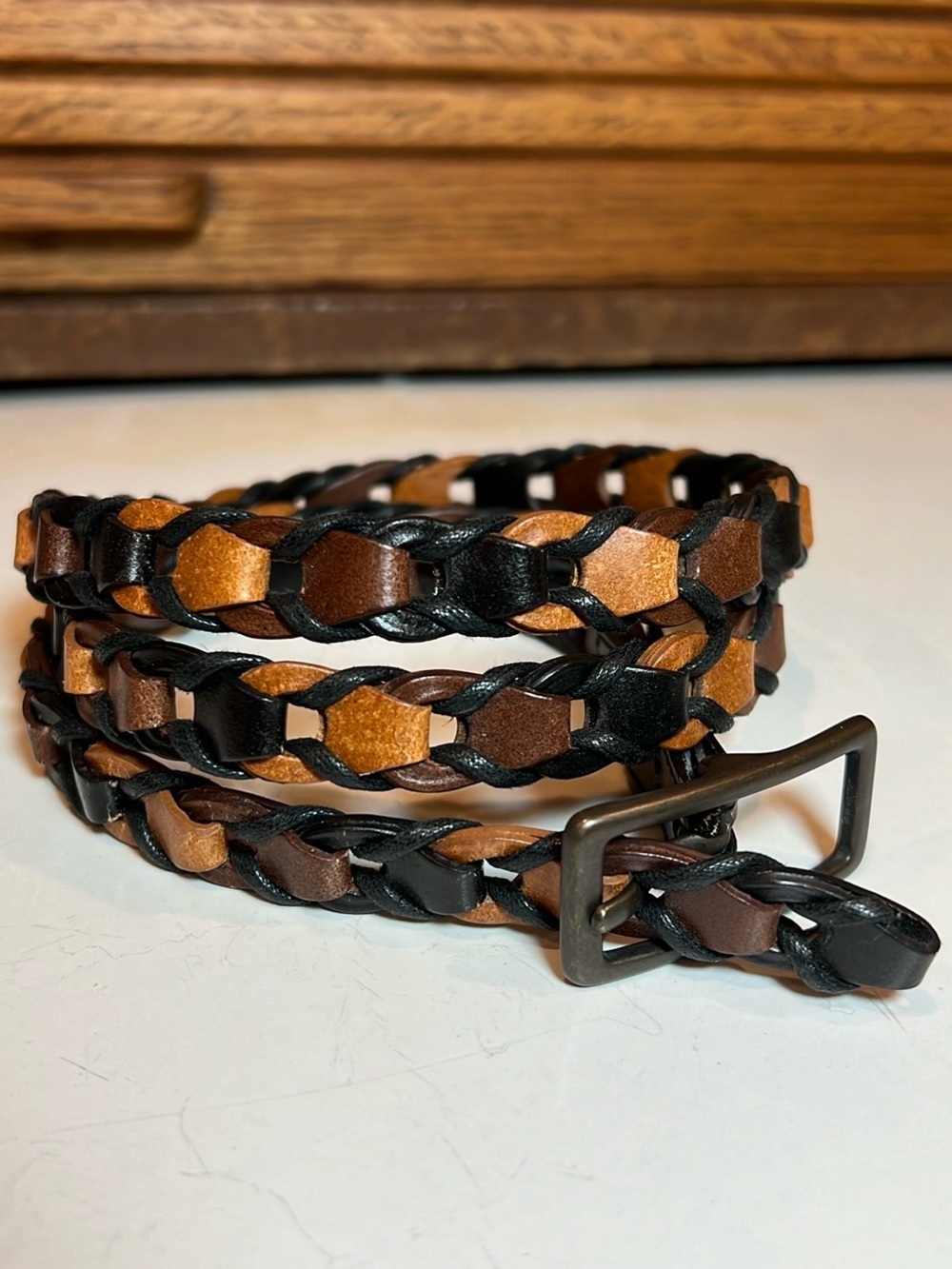 EUC woven leather belt in tan, brown, & chestnut